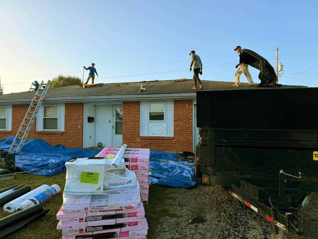 Pristine Roofing crew tearing off an old roof